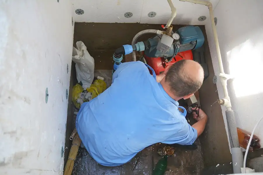 Jim Wilson Plumbing, installing well pump/controls - Springfield, IL